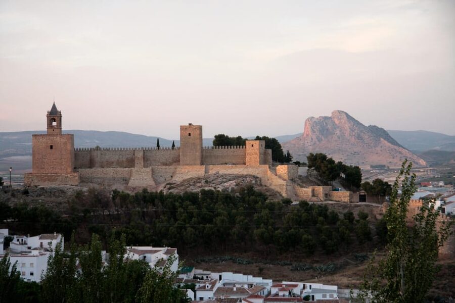Antequera World Heritage guided tour guide - Plaza Coso Viejo pickup, white van rides, and a calm group pace