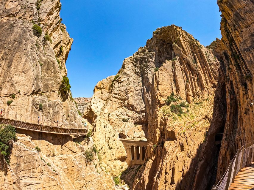 Caminito del Rey: Guided Tour and Entry Ticket - History on the walls: railway, hydroelectric power, and settlement clues