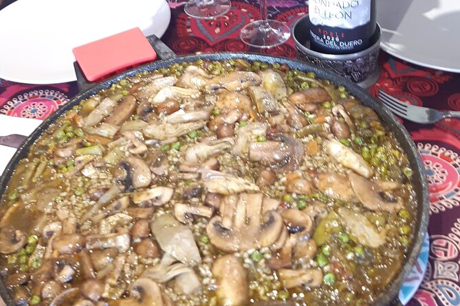 Chefcooking Paella from our Andalusian Grandmother at a Family Farm - Drinks, Water, and the Little Details That Make It Feel Thoughtful