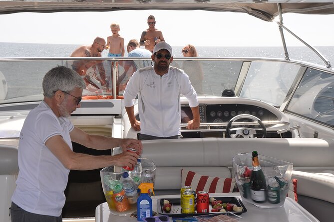 Enjoy the Marbella Coast on the Sunseeker 63 Predator Yacht - Bathroom stops plus paddle surfing and snorkeling options