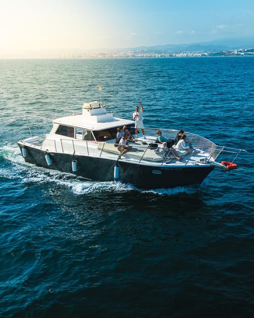 Estepona: Dolphins Searching Sea Cruise with Drink & Snacks - Your 2-hour cruise flow: drinks, coastline views, and a weather-based swim