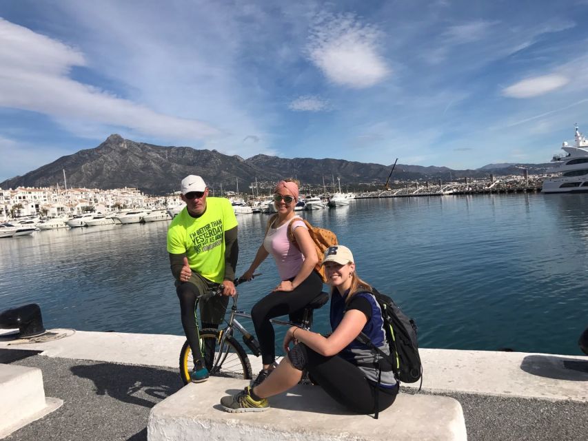 From Marbella: Guided Bicycle Tour to Puerto Banús - Marbella along the promenade, parks, and the historic-center feel