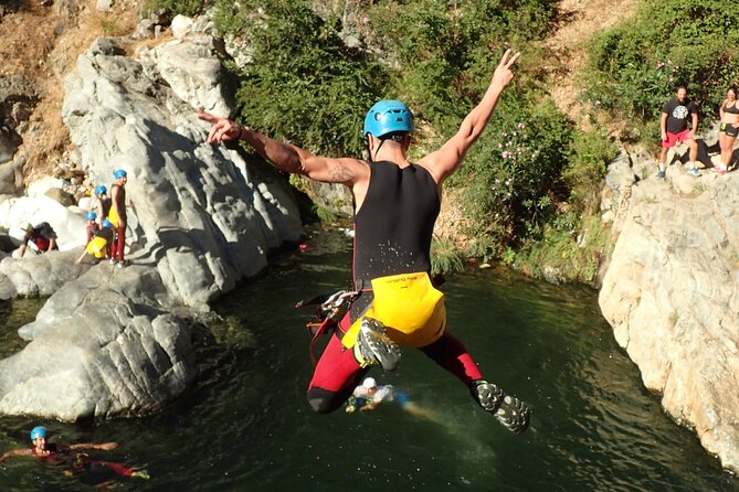 From Mijas: Guadalmina Canyon Canyoning Tour - Slides and the 5 m rappel: the “ok, that’s real” moments