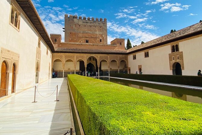 Full-Day Alhambra from Malaga: Choose Your Access & Pick Up Point - Picking Essential or Full Tour, and what changes inside the Alhambra