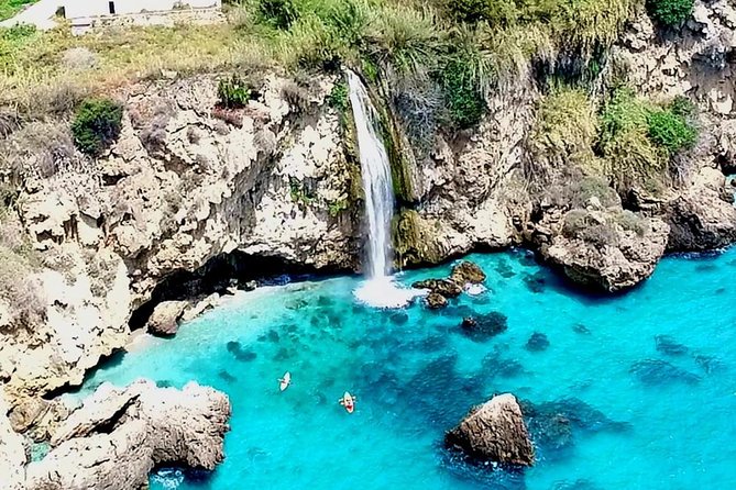 Luxury Yatch trips + Open Bar + Tapas + Paddle Surf + Snorkel - Stop 1: Cliffs of Maro and Cerro Gordo, where the water activities actually matter