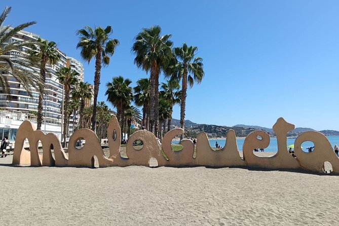 Malaga Bike Tour - Wine & Tapas - Plaza de la Merced: a glass of Malaga wine before the sea