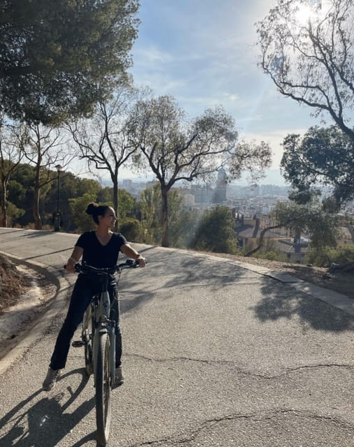 Malaga: Castle Hill and Fisherman Village E-Bike Tour - Muelle Uno port ride: modern Málaga after the older neighborhoods