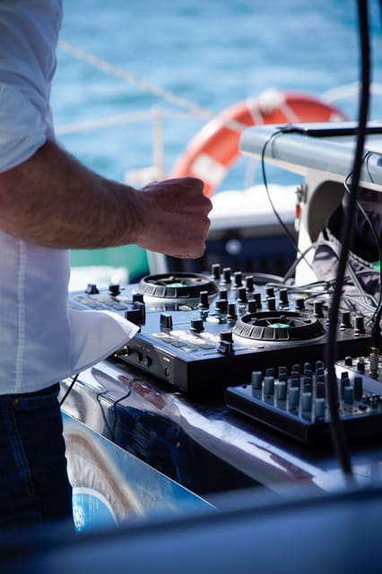 Malaga: Catamaran Sailing Cruise with Swimming & Optional DJ - Crowd, Seats, and How To Choose Your Spot