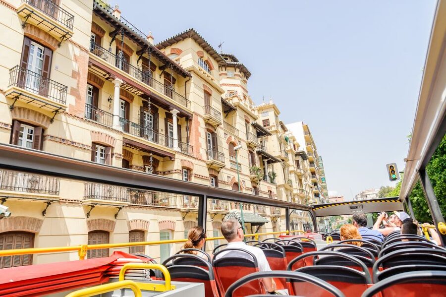 Malaga: City Sightseeing Hop-On Hop-Off Bus Tour - Audio guide, headphones, and the app: small details that change your day