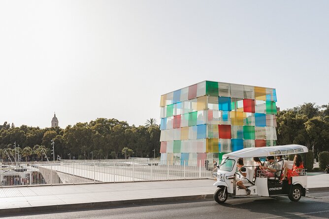 Malaga Expert Tour with Local Guide in Eco Tuk Tuk Private - Getting your bearings: Plaza de la Marina to the city center flow