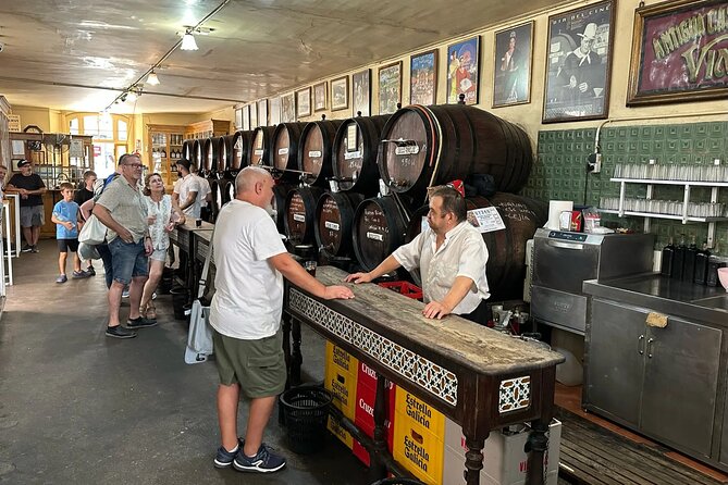 Malaga Food Walking Tour with Atarazanas Market Visit - Price and value: $108.02 for 2.5 hours and a meal