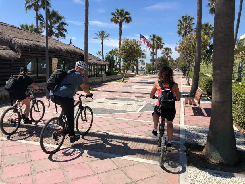 Malaga: Premium Guided Bike Tour - Riding through parks, and why that “green break” is a smart move