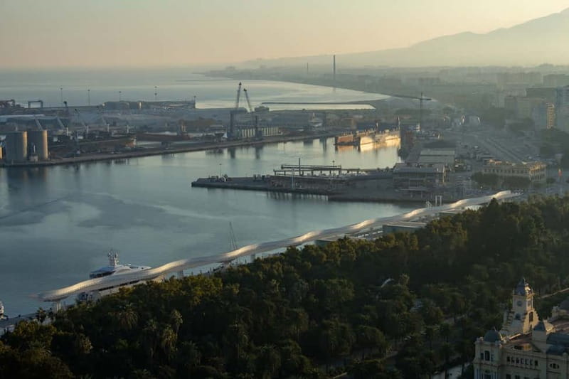 Malaga: Private Walking Tour with Official Guide - Port and beach lifestyle: lighthouse, Malagueta, and seafood culture