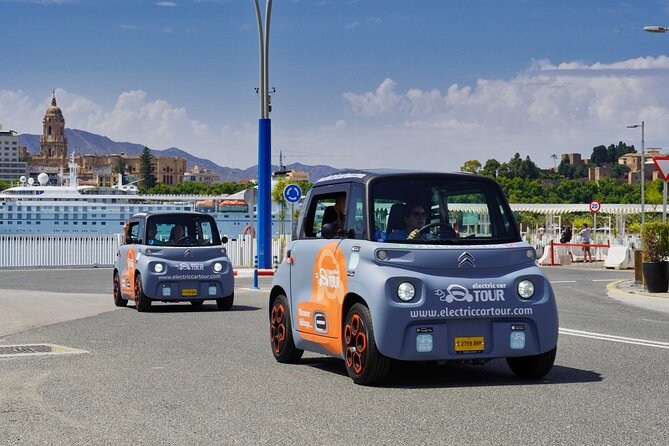 Málaga Sunset & Night Tour by Electric Car - The Bourgeois Mansions and the Climb Toward Gibralfaro