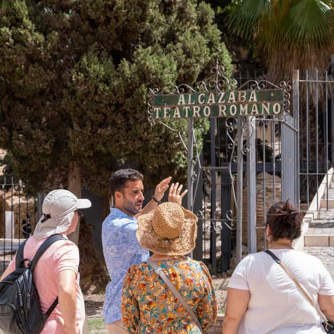 Malaga Walking Tour, Roman Theater and Alcazaba in small group with Tickets - Entering the Roman Theater: a ticketed moment with big atmosphere