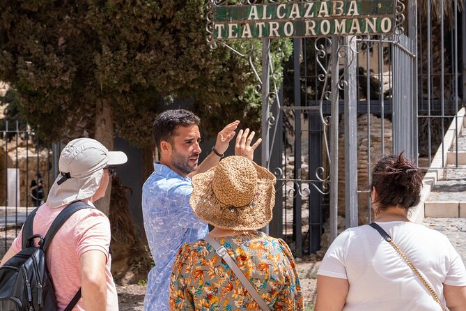 Malaga Walking Tour, Roman Theatre and Alcazaba with Tickets Included - Parroquia Santiago Apostol and Plaza de la Merced: the baptism connection and the birthplace area