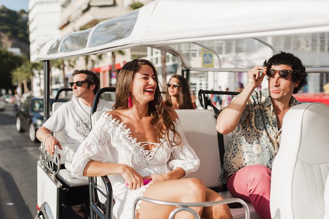 Malaga Welcome Tour with Local Guide in Eco Tuk Tuk Private - La Farola lighthouse and the port edge, the sea view that keeps giving