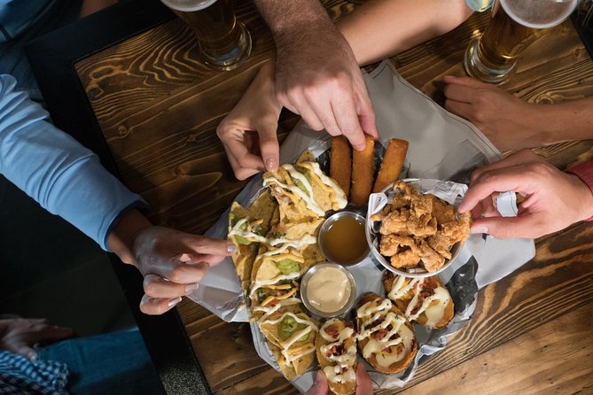 Marbella Food Tour: Tapas, Drinks and Delights with a Local - Plaza de la Victoria: Boquerones en Vinagre and Croquetas Caseras