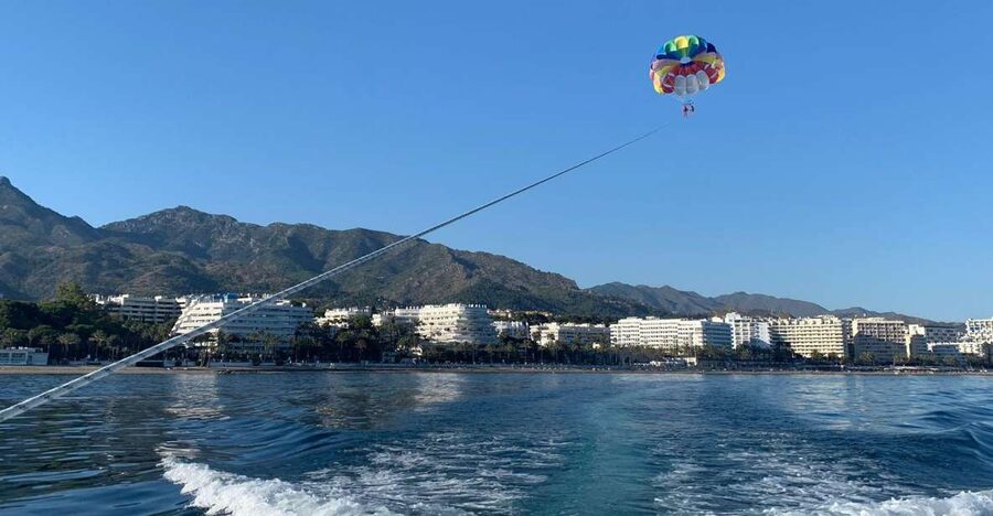 Marbella from the heights: Parasailing - Where the action starts in Marbella, right by the port