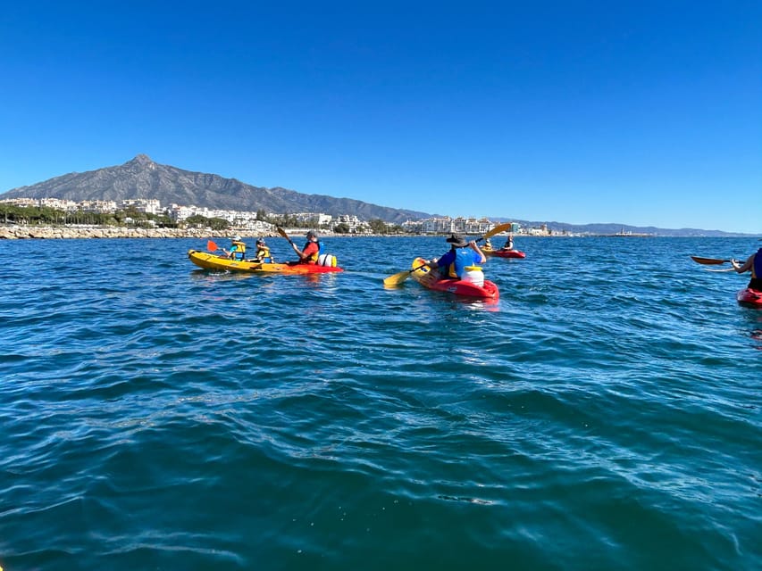 Marbella: Guided Kayak Tour in Puerto Banús - Sunrise session: the calm sea and the gold-light photos