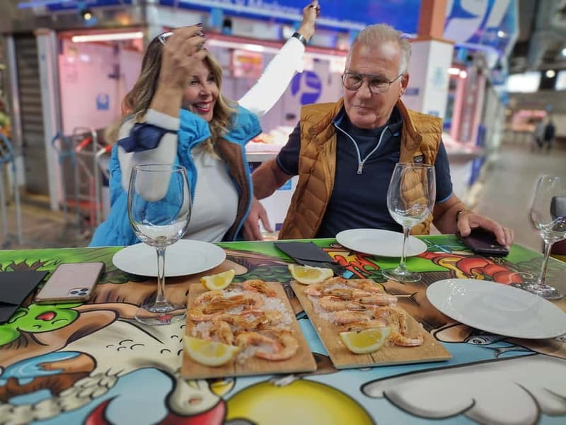 Marbella: Guided Market Tour with Tapas and Wine Pairings - Entering the market for tastings, cured meats to seafood on the spot
