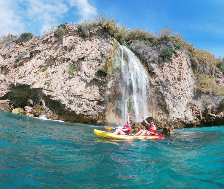 Nerja: Guided Kayak Tour Nerja Cliffs and Maro Waterfall - Entering the cliff-and-cave route that cars and roads cannot reach