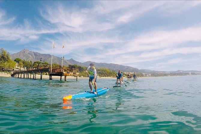 Paddle Boarding Tour on the beautiful Marbella Coast - The coaching moment: getting standing in Marbella water
